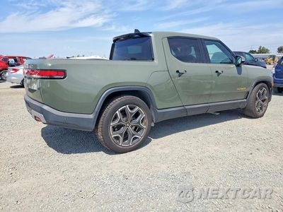 Trzecie zdjęcie samochodu z tyłu: 2022 RIVIAN R1T LAUNCH EDITION VIN:7FCTGAAL1NN004036 - miniatura