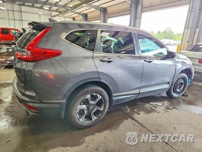 Trzecie zdjęcie samochodu z tyłu: 2017 HONDA CR-V TOURING VIN:5J6RW2H95HL033634 - miniatura