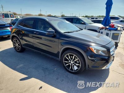 Czwarte zdjęcie samochodu z boku: 2015 MERCEDES-BENZ GLA 250 4MATIC VIN:WDCTG4GB4FJ156501 - miniatura