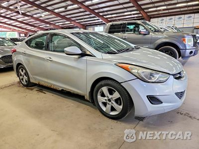Czwarte zdjęcie samochodu z boku: 2013 HYUNDAI ELANTRA GLS VIN:5NPDH4AE0DH173831 - miniatura