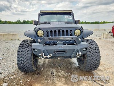 Piąte zdjęcie samochodu w środku: 2017 JEEP WRANGLER UNLIMITED SPORT VIN:1C4BJWDG5HL627030 - miniatura