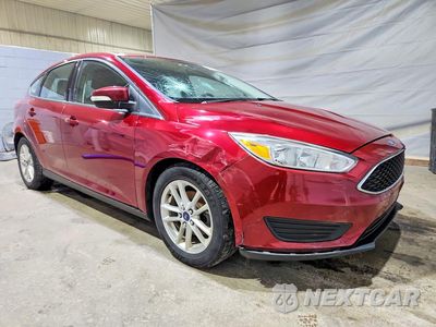 Czwarte zdjęcie samochodu z boku: 2016 FORD FOCUS SE VIN:1FADP3K27GL223650 - miniatura
