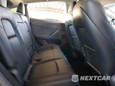 Zdjęcie 10 z 13 samochodu: 2023 TESLA MODEL Y VIN:7SAYGDEE9PF828668 - miniatura