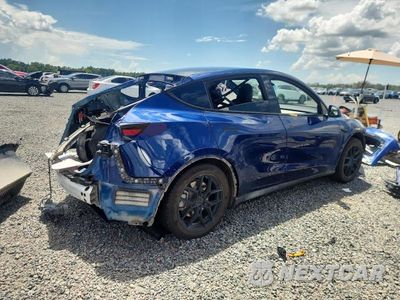 Trzecie zdjęcie samochodu z tyłu: 2023 TESLA MODEL Y VIN:7SAYGDEE5PA194997 - miniatura