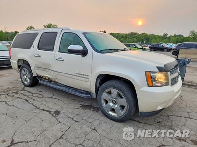 Czwarte zdjęcie samochodu z boku: 2010 CHEVROLET SUBURBAN K1500 LTZ VIN:1GNUKKE31AR273981 - miniatura