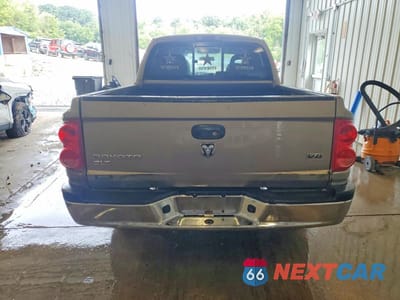 Zdjęcie 6 z 11 samochodu: 2006 DODGE DAKOTA QUAD SLT VIN:1D7HW48NX6S716058 - miniatura