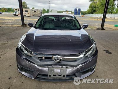 Piąte zdjęcie samochodu w środku: 2017 HONDA CIVIC TOURING VIN:2HGFC1F92HH647456 - miniatura