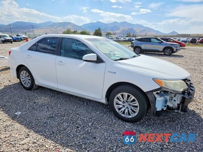 Czwarte zdjęcie samochodu z boku: 2012 TOYOTA CAMRY HYBRID LE VIN:4T1BD1FK6CU055475 - miniatura