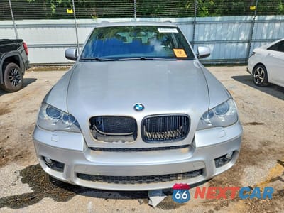 Piąte zdjęcie samochodu w środku: 2013 BMW X5 VIN:5UXZV4C51D0E11082 - miniatura