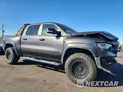 Czwarte zdjęcie samochodu z boku: 2022 RAM 1500 TRX VIN:1C6SRFU93NN150311 - miniatura