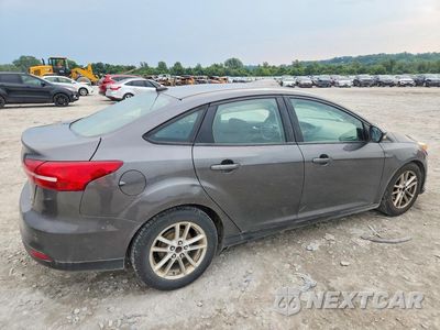 Trzecie zdjęcie samochodu z tyłu: 2016 FORD FOCUS SE VIN:1FADP3F28GL242752 - miniatura