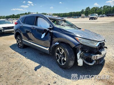 Czwarte zdjęcie samochodu z boku: 2019 HONDA CR-V TOURING VIN:2HKRW1H98KH502629 - miniatura