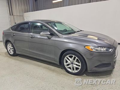 Czwarte zdjęcie samochodu z boku: 2014 FORD FUSION SE VIN:3FA6P0H73ER339341 - miniatura