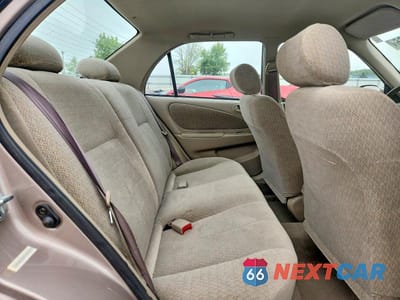Zdjęcie 10 z 13 samochodu: 2002 TOYOTA COROLLA LE VIN:2T1BR12E72C527412 - miniatura