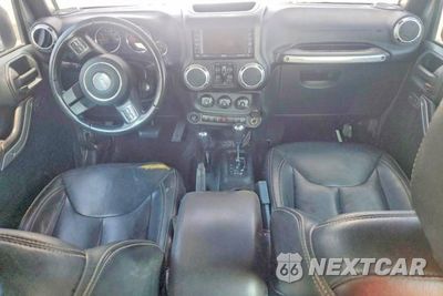 Zdjęcie 8 z 14 samochodu: 2015 JEEP WRANGLER UNLIMITED SAHARA VIN:1C4BJWEG0FL537960 - miniatura
