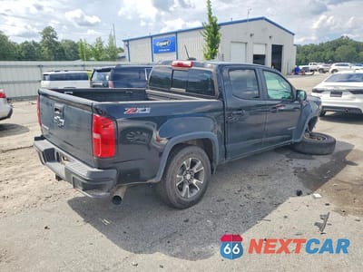 Trzecie zdjęcie samochodu z tyłu: 2016 CHEVROLET COLORADO Z71 VIN:1GCPTDE14G1250621 - miniatura