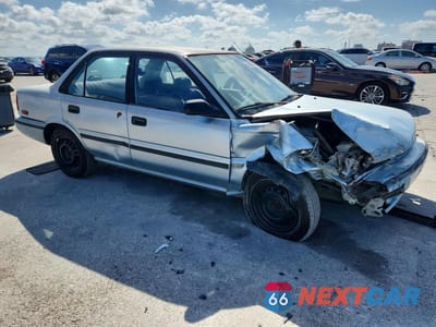 Czwarte zdjęcie samochodu z boku: 1992 TOYOTA COROLLA DELUXE VIN:1NXAE94A6NZ378543 - miniatura