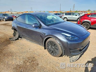 Czwarte zdjęcie samochodu z boku: 2024 TESLA MODEL Y VIN:7SAYGDEDXRF150765 - miniatura