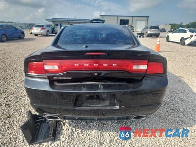 Zdjęcie 6 z 12 samochodu: 2013 DODGE CHARGER POLICE VIN:2C3CDXATXDH548340 - miniatura