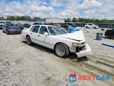 Czwarte zdjęcie samochodu z boku: 1996 LINCOLN TOWN CAR EXECUTIVE VIN:1LNLM81W6TY717314 - miniatura