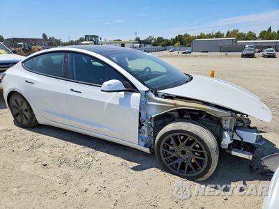 Czwarte zdjęcie samochodu z boku: 2024 TESLA MODEL 3 VIN:5YJ3E1EA4RF747850 - miniatura