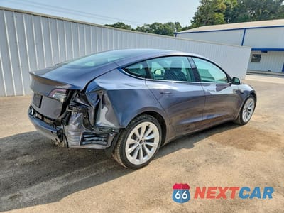 Trzecie zdjęcie samochodu z tyłu: 2023 TESLA MODEL 3 VIN:5YJ3E1EAXPF446710 - miniatura