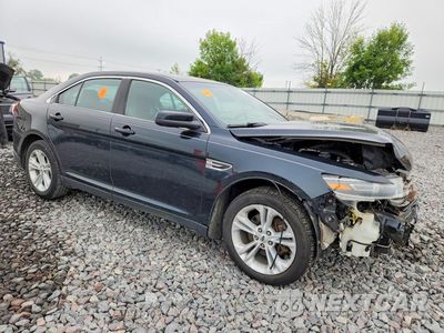 Czwarte zdjęcie samochodu z boku: 2014 FORD TAURUS SEL VIN:1FAHP2E85EG185322 - miniatura