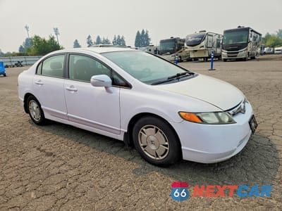 Czwarte zdjęcie samochodu z boku: 2009 HONDA CIVIC HYBRID VIN:JHMFA362X9S013310 - miniatura