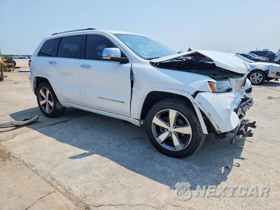 Czwarte zdjęcie samochodu z boku: 2014 JEEP GRAND CHEROKEE OVERLAND VIN:1C4RJECG6EC265716 - miniatura