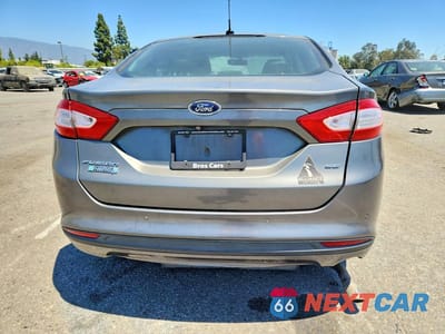 Zdjęcie 6 z 12 samochodu: 2014 FORD FUSION SE PHEV VIN:3FA6P0PUXER256237 - miniatura