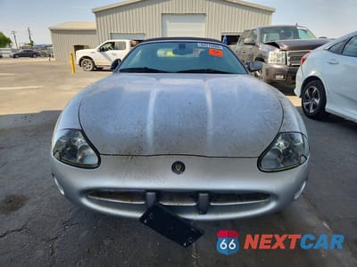 Piąte zdjęcie samochodu w środku: 2003 JAGUAR XK8 VIN:SAJDA42C332A36579 - miniatura