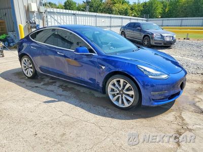 Czwarte zdjęcie samochodu z boku: 2019 TESLA MODEL 3 VIN:5YJ3E1EB8KF437666 - miniatura