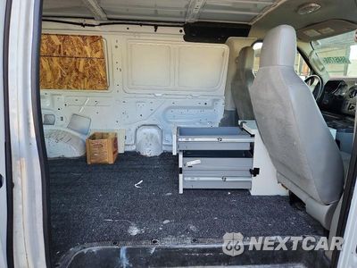 Zdjęcie 11 z 13 samochodu: 2014 FORD ECONOLINE E150 VAN VIN:1FTNE1EWXEDA35042 - miniatura