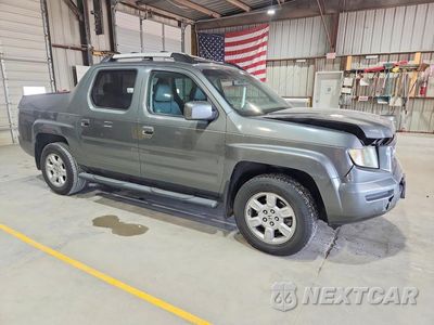 Czwarte zdjęcie samochodu z boku: 2007 HONDA RIDGELINE RTL VIN:2HJYK16587H504741 - miniatura