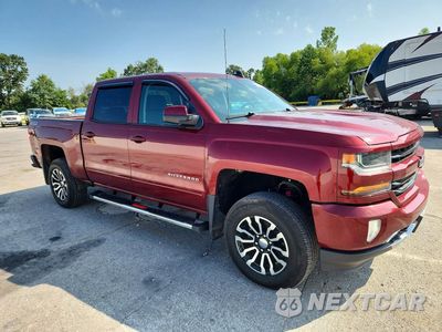 Czwarte zdjęcie samochodu z boku: 2017 CHEVROLET SILVERADO K1500 LT VIN:3GCUKREC6HG293655 - miniatura