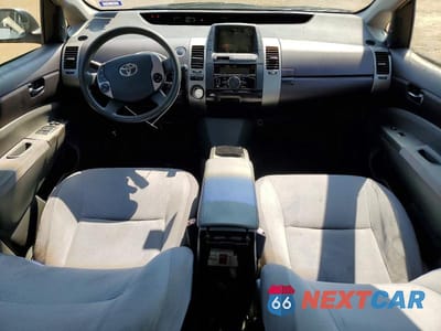Zdjęcie 8 z 12 samochodu: 2005 TOYOTA PRIUS HYBR VIN:JTDKB20U250127244 - miniatura