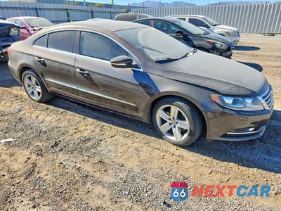 Czwarte zdjęcie samochodu z boku: 2015 VOLKSWAGEN CC SPORT VIN:WVWBP7AN6FE827939 - miniatura