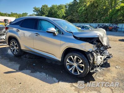 Czwarte zdjęcie samochodu z boku: 2017 LEXUS RX 350 BASE VIN:2T2ZZMCA4HC050955 - miniatura