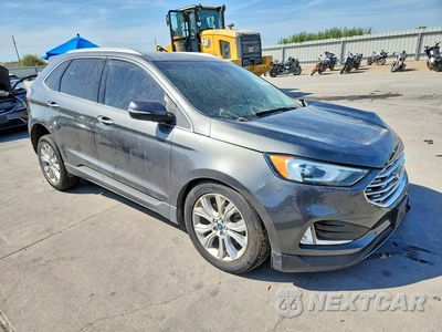 Czwarte zdjęcie samochodu z boku: 2019 FORD EDGE TITANIUM VIN:2FMPK4K92KBC02136 - miniatura