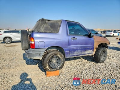Trzecie zdjęcie samochodu z tyłu: 1999 CHEVROLET TRACKER VIN:2CNBJ18C3X6906067 - miniatura