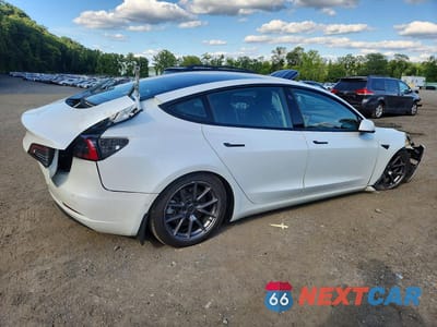 Trzecie zdjęcie samochodu z tyłu: 2022 TESLA MODEL 3 VIN:5YJ3E1EB5NF249997 - miniatura