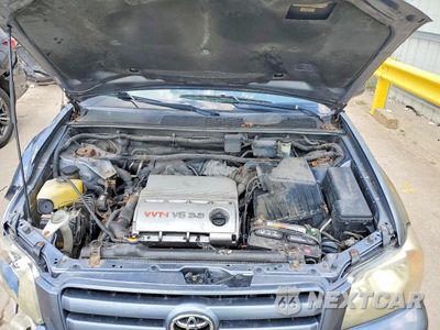 Zdjęcie 12 z 13 samochodu: 2007 TOYOTA HIGHLANDER BASE VIN:JTEEP21AX70210311 - miniatura