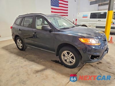 Czwarte zdjęcie samochodu z boku: 2010 HYUNDAI SANTA FE GLS VIN:5NMSGDAB8AH412891 - miniatura