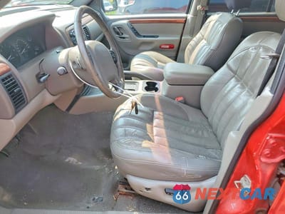 Zdjęcie 7 z 13 samochodu: 1999 JEEP GRAND CHEROKEE LIMITED VIN:1J4GW68NXXC702510 - miniatura