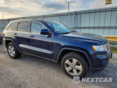 Czwarte zdjęcie samochodu z boku: 2012 JEEP GRAND CHEROKEE LAREDO VIN:1C4RJFAG3CC233313 - miniatura
