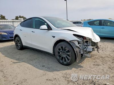 Czwarte zdjęcie samochodu z boku: 2021 TESLA MODEL Y VIN:5YJYGAEEXMF243217 - miniatura