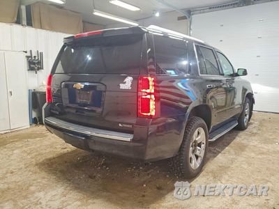 Trzecie zdjęcie samochodu z tyłu: 2017 CHEVROLET TAHOE K1500 PREMIER VIN:1GNSKCKC0HR288175 - miniatura