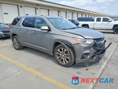 Czwarte zdjęcie samochodu z boku: 2018 CHEVROLET TRAVERSE PREMIER VIN:1GNEVJKW7JJ234167 - miniatura