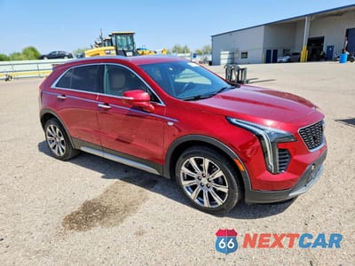 Czwarte zdjęcie samochodu z boku: 2019 CADILLAC XT4 PREMIUM LUXURY VIN:1GYFZCR46KF169991 - miniatura