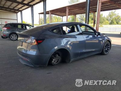 Trzecie zdjęcie samochodu z tyłu: 2023 TESLA MODEL Y VIN:7SAYGDEE9PF828668 - miniatura